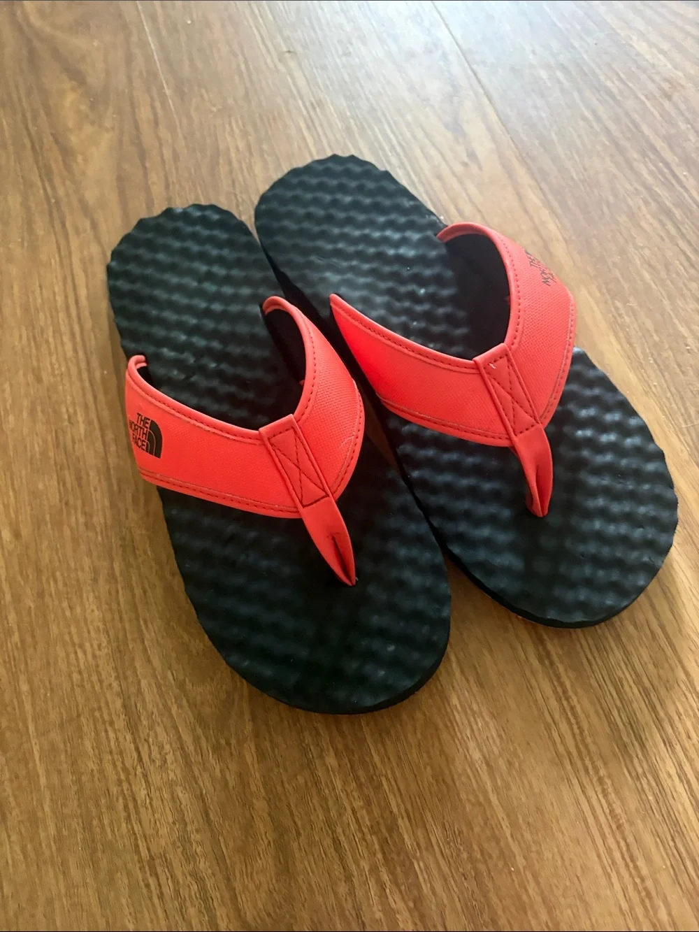 The North Face Red and Black Thong Sandals